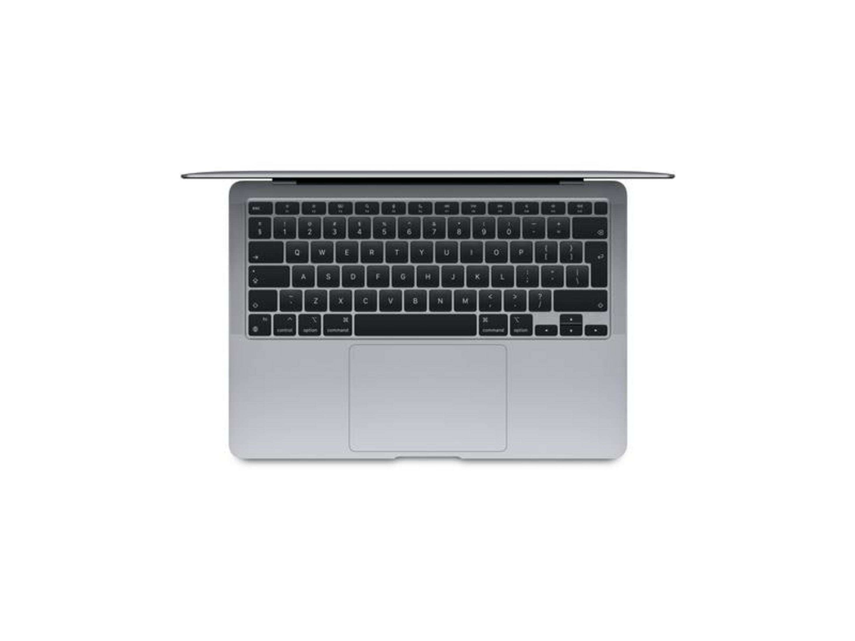 Srebrny laptop z klawiaturą i gładzikiem, widok z góry.
