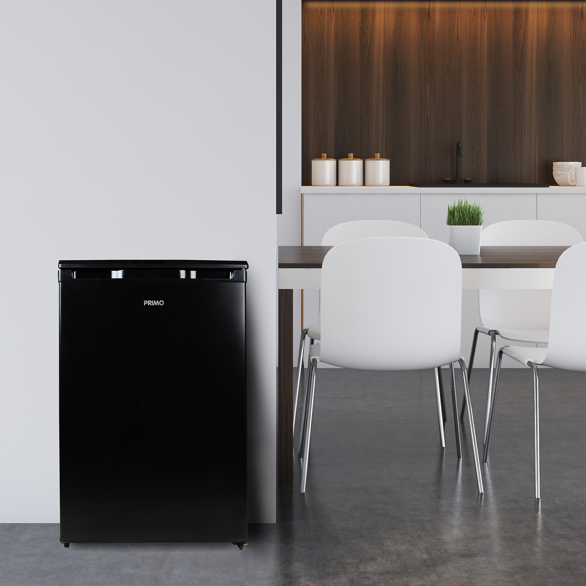 A black refrigerator stands next to a dining table with white chairs.