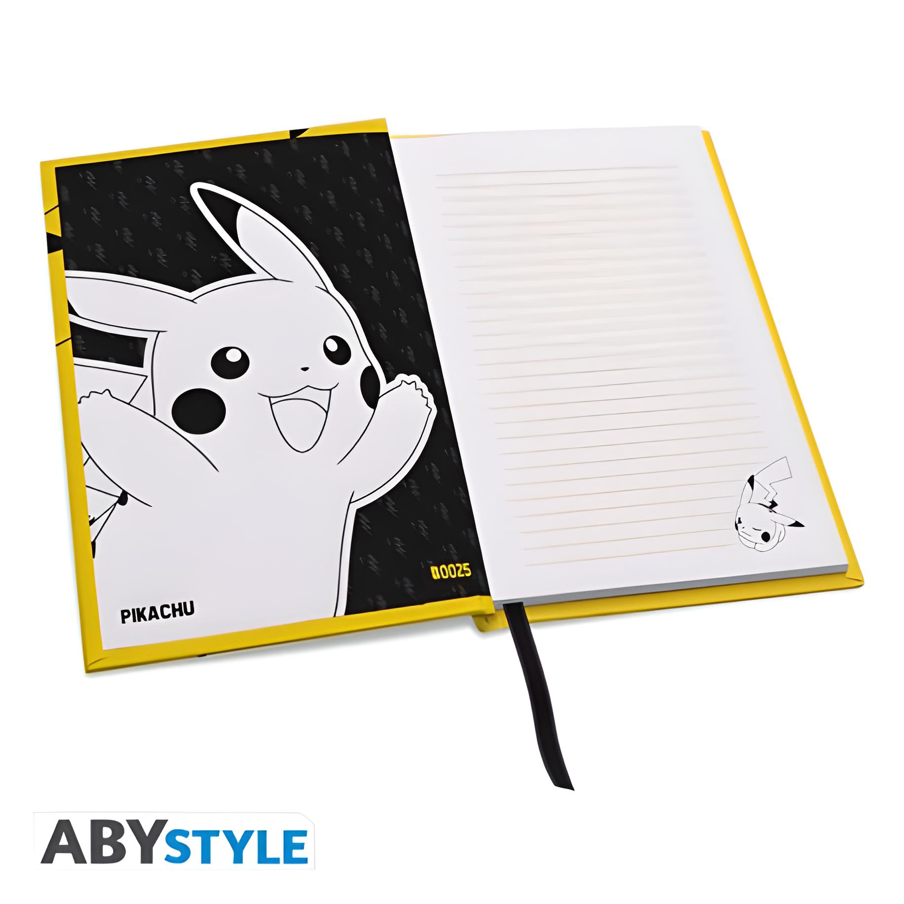 Ein gelbes Notizbuch mit Pikachu-Motiv und linierten Seiten.