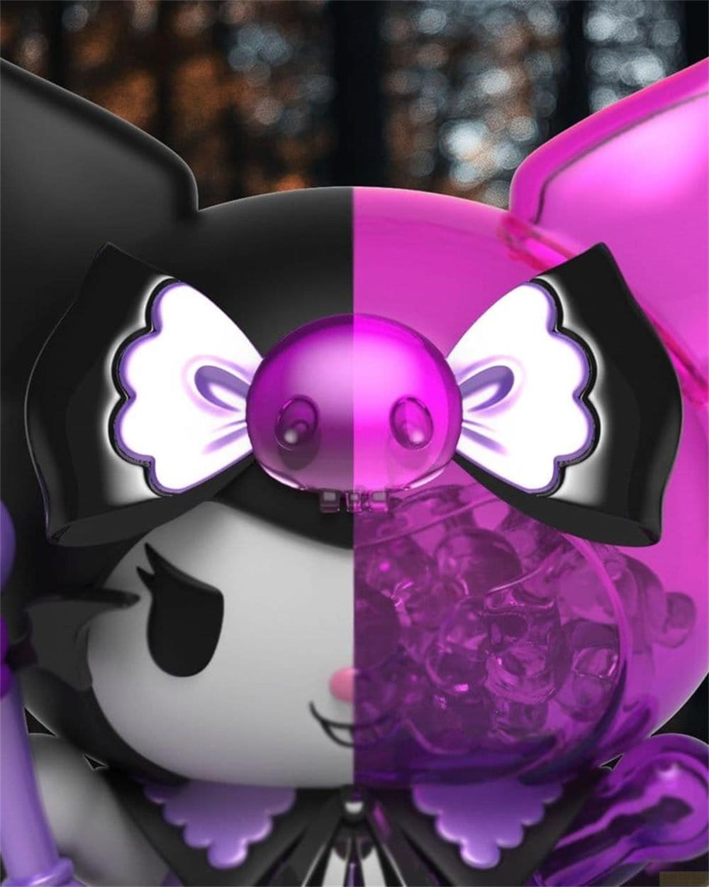 Halb schwarze, halb pinke Figur mit Schleife und sichtbaren lila Kristallen.