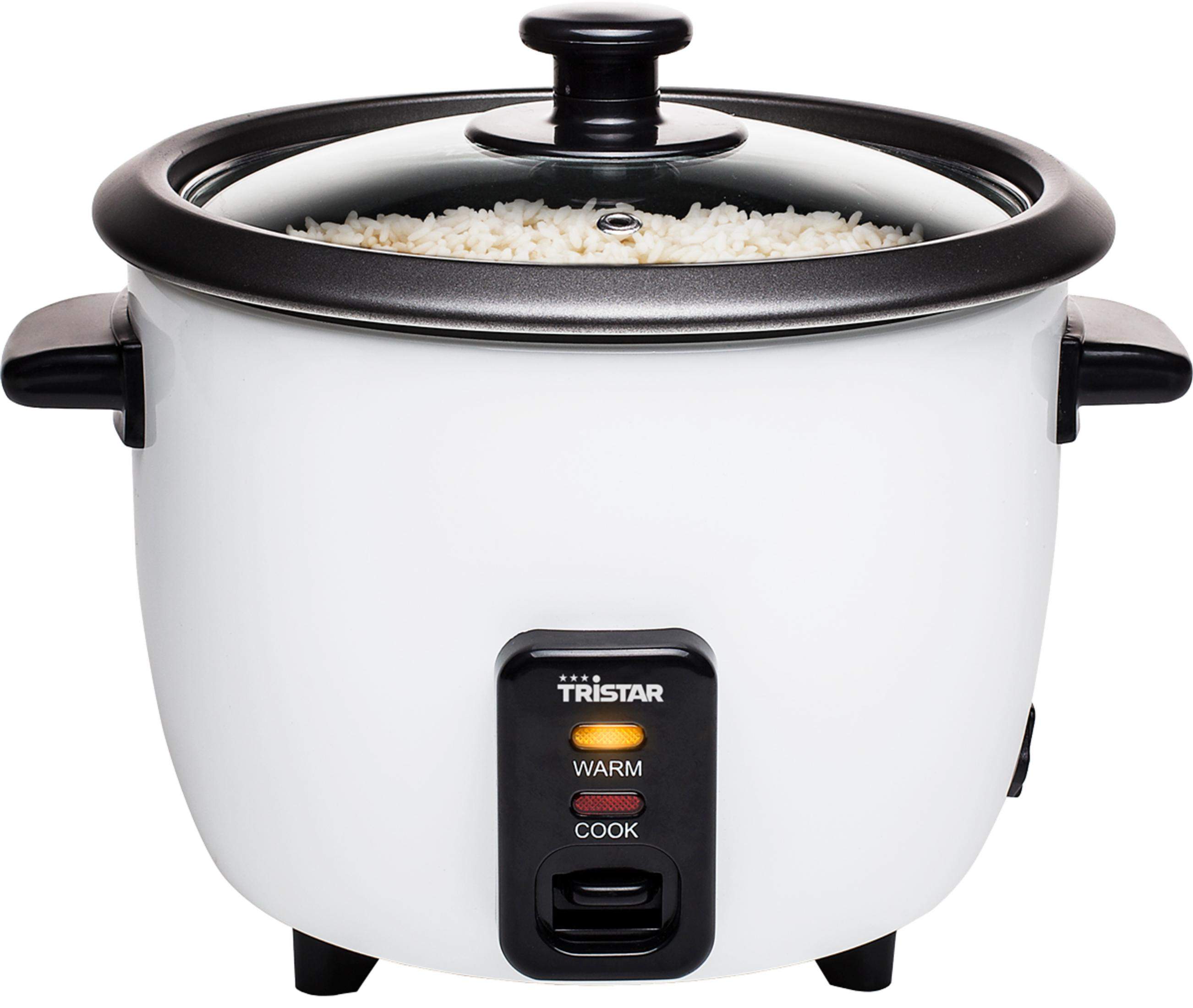 Une mijoteuse à riz blanche avec couvercle en verre, remplie de riz cuit.