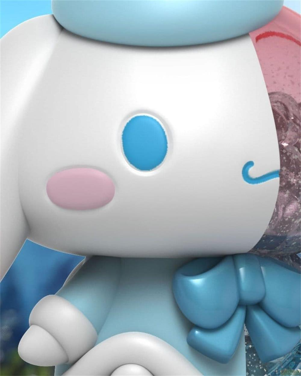 Eine weiße Figur mit blauen und rosa Akzenten trägt eine blaue Schleife.