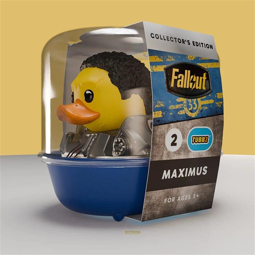 Gelber Gummi-Ente im "Fallout"-Design mit schwarzem Haar in einer blauen Verpackung.