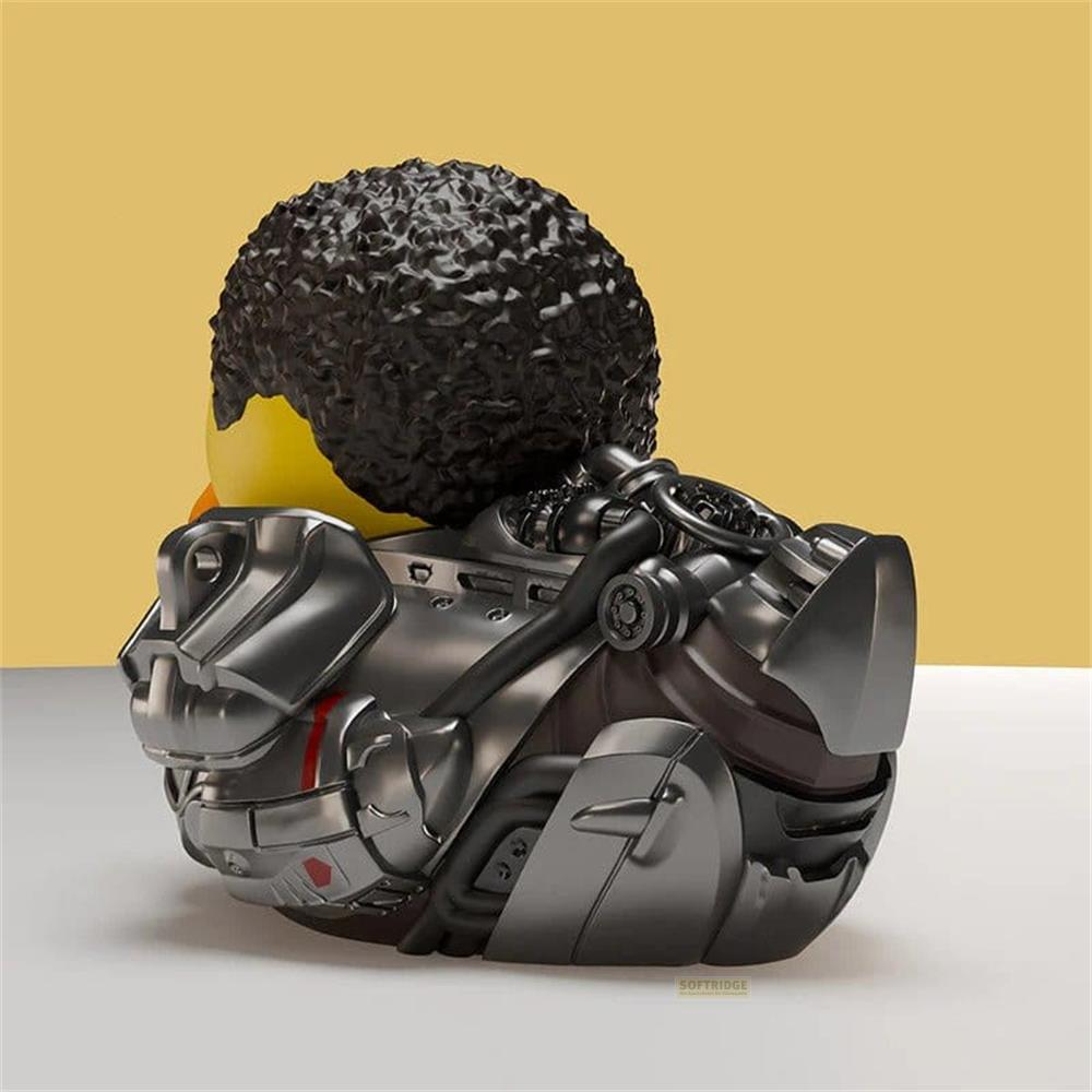 Ein Cyborg-Gummientchen mit schwarzem Afro und metallischem Körper.