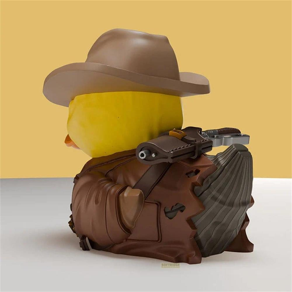Eine gelbe Gummiente mit braunem Cowboyhut und brauner Lederjacke.