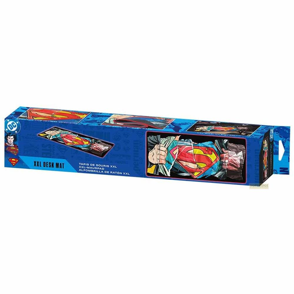 Verpackung einer XXL-Schreibtischunterlage mit Superman-Logo und Comic-Motiven.