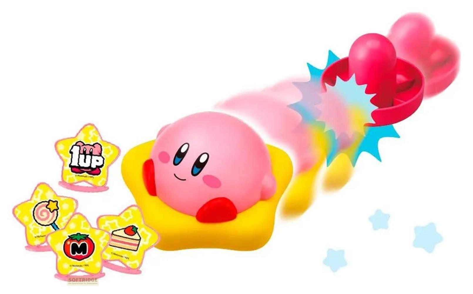 Kirby auf einem gelben Podest, umgeben von Sternen mit Leckereien und einem 1-UP-Symbol.