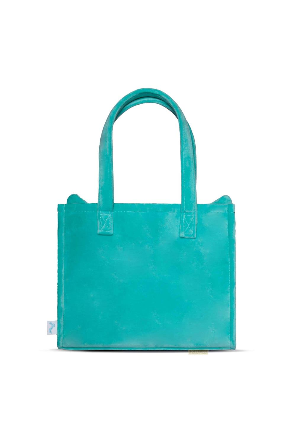 Un pequeño bolso tote de terciopelo azul verdoso con dos asas, aislado sobre fondo blanco.