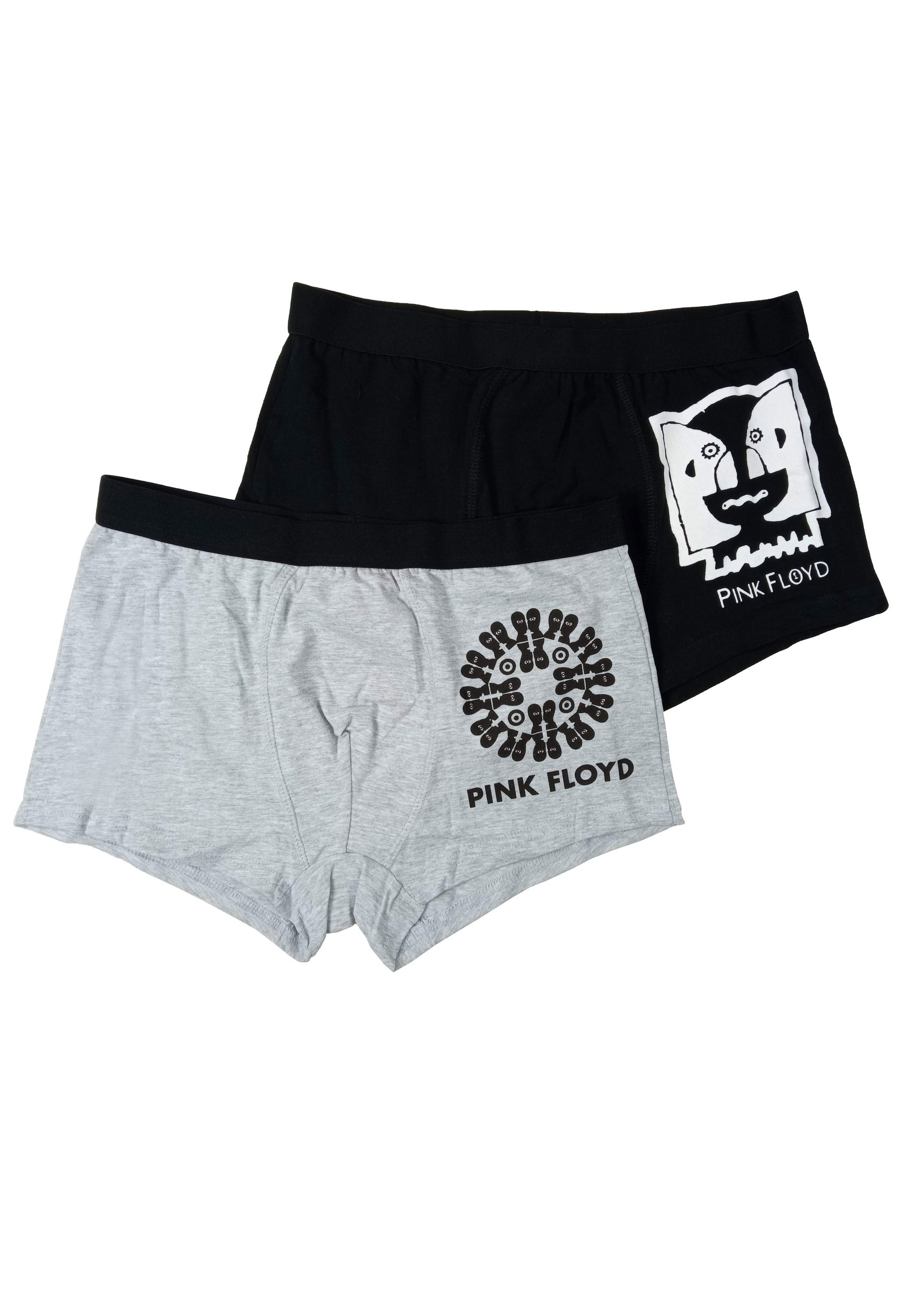 Zwei Boxershorts: eine graue mit Kreis-Print, eine schwarze mit Gesicht-Print.