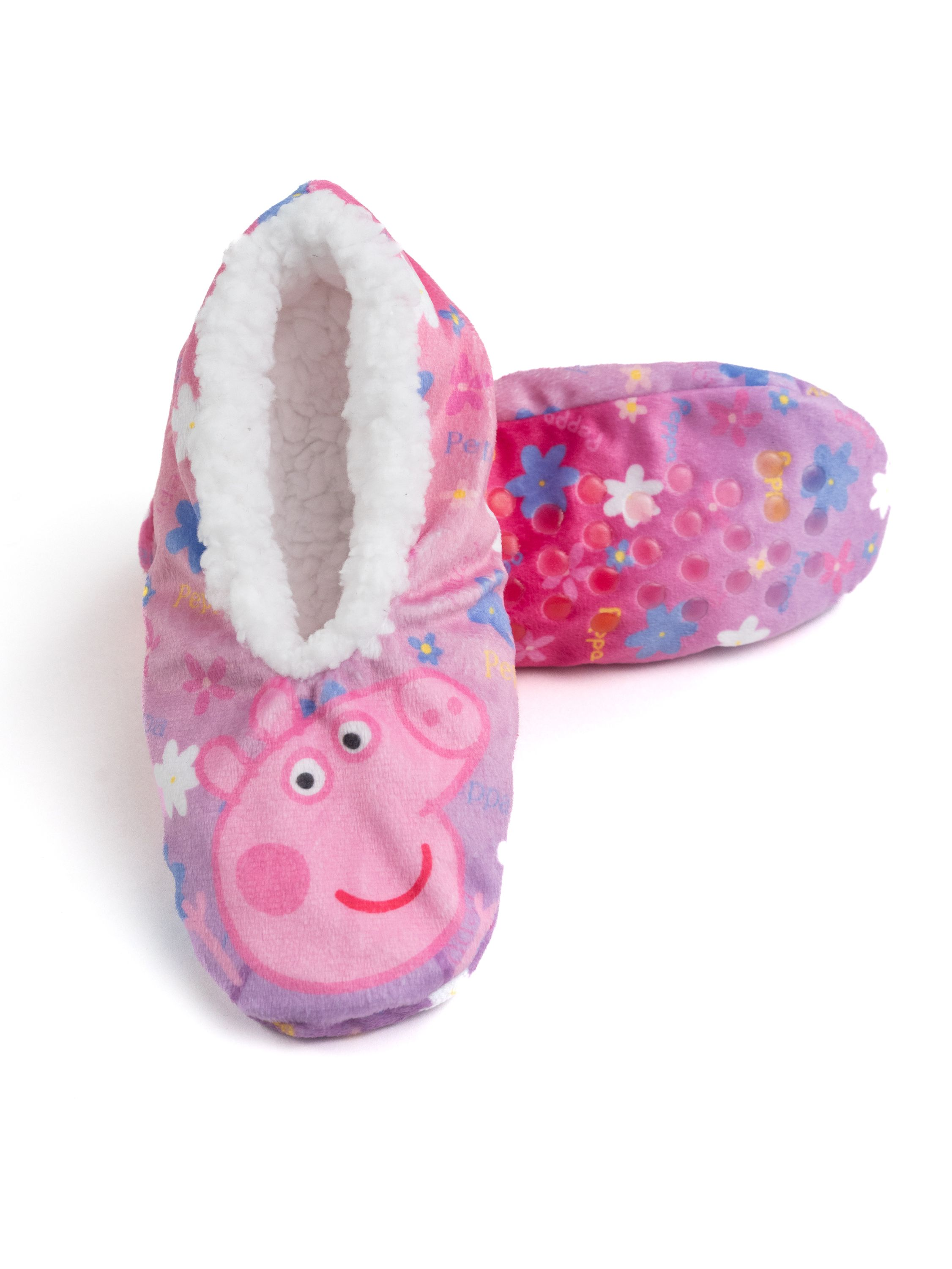Zwei rosa Peppa Wutz Hausschuhe mit Blumenmuster und weißem Fell.