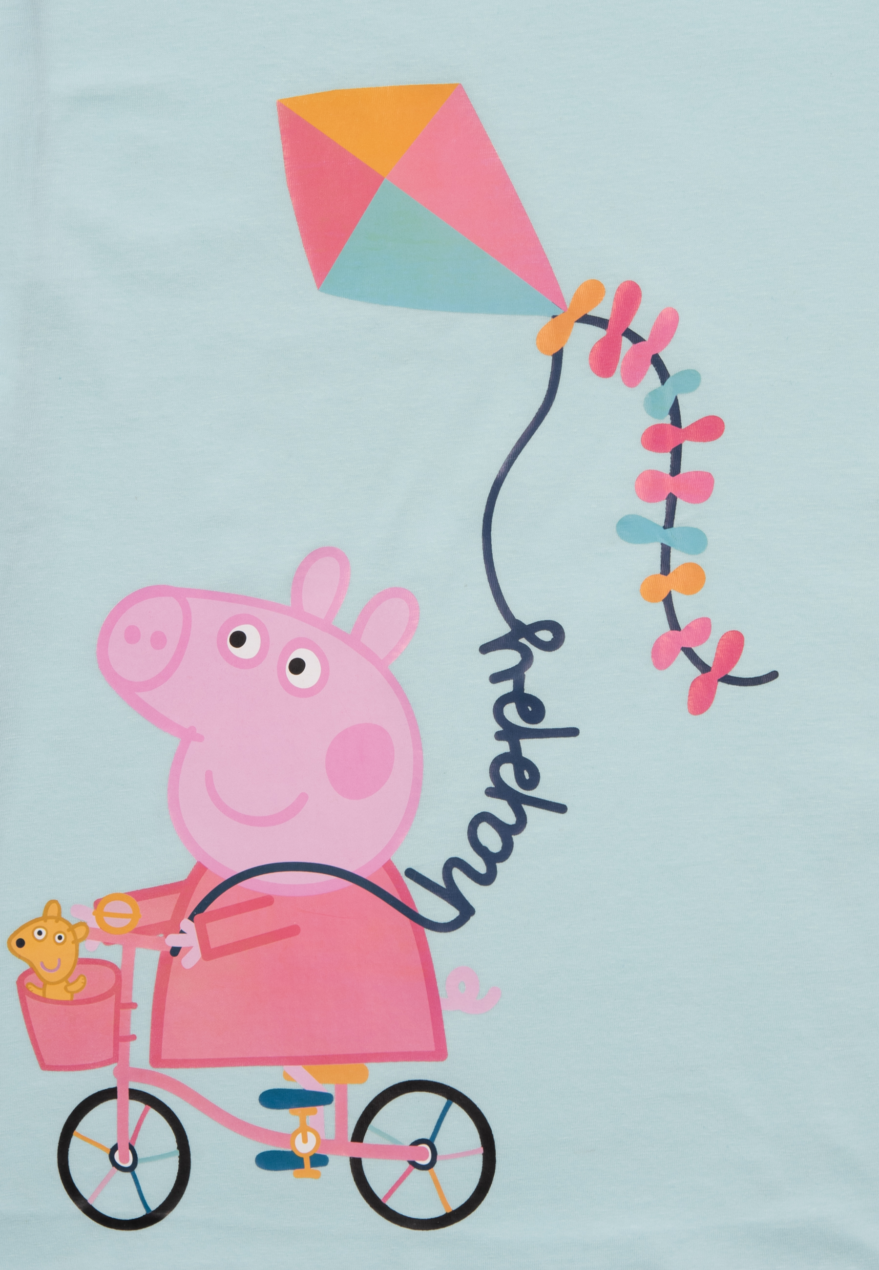 Peppa Wutz fährt Fahrrad mit einem Teddy im Korb und einem bunten Drachen.