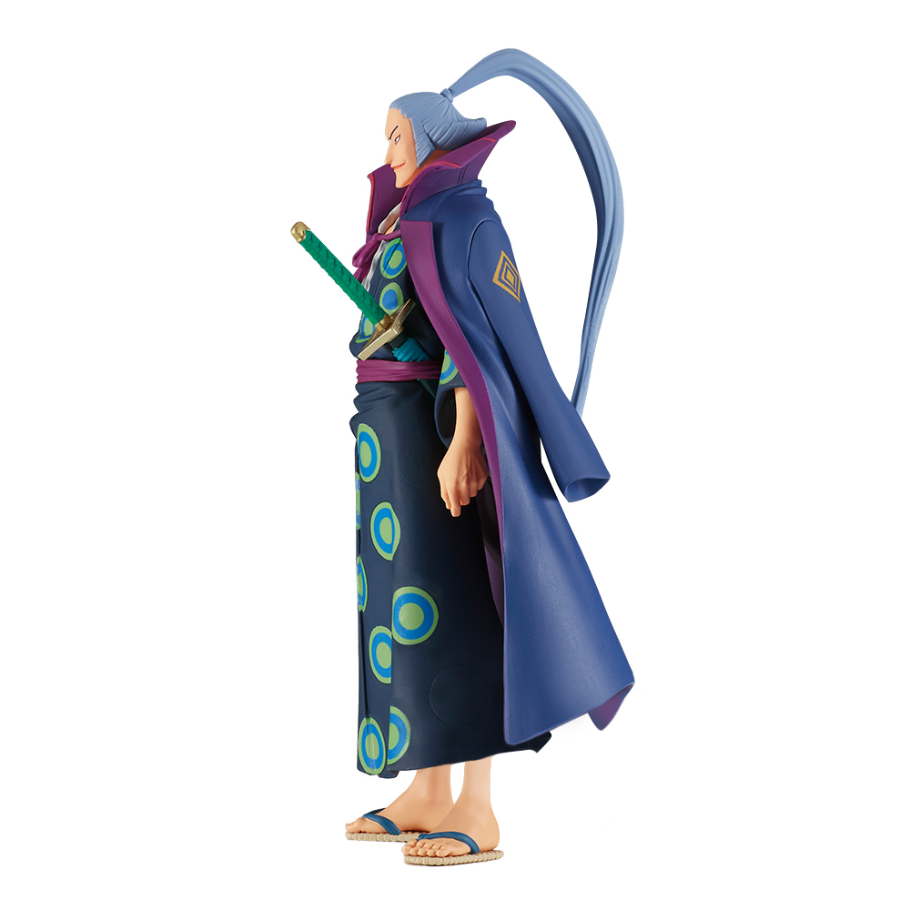 Eine Figur mit blauem Haar im Dutt, trägt einen blauen Umhang über dunkler Kleidung mit Kreisen.
