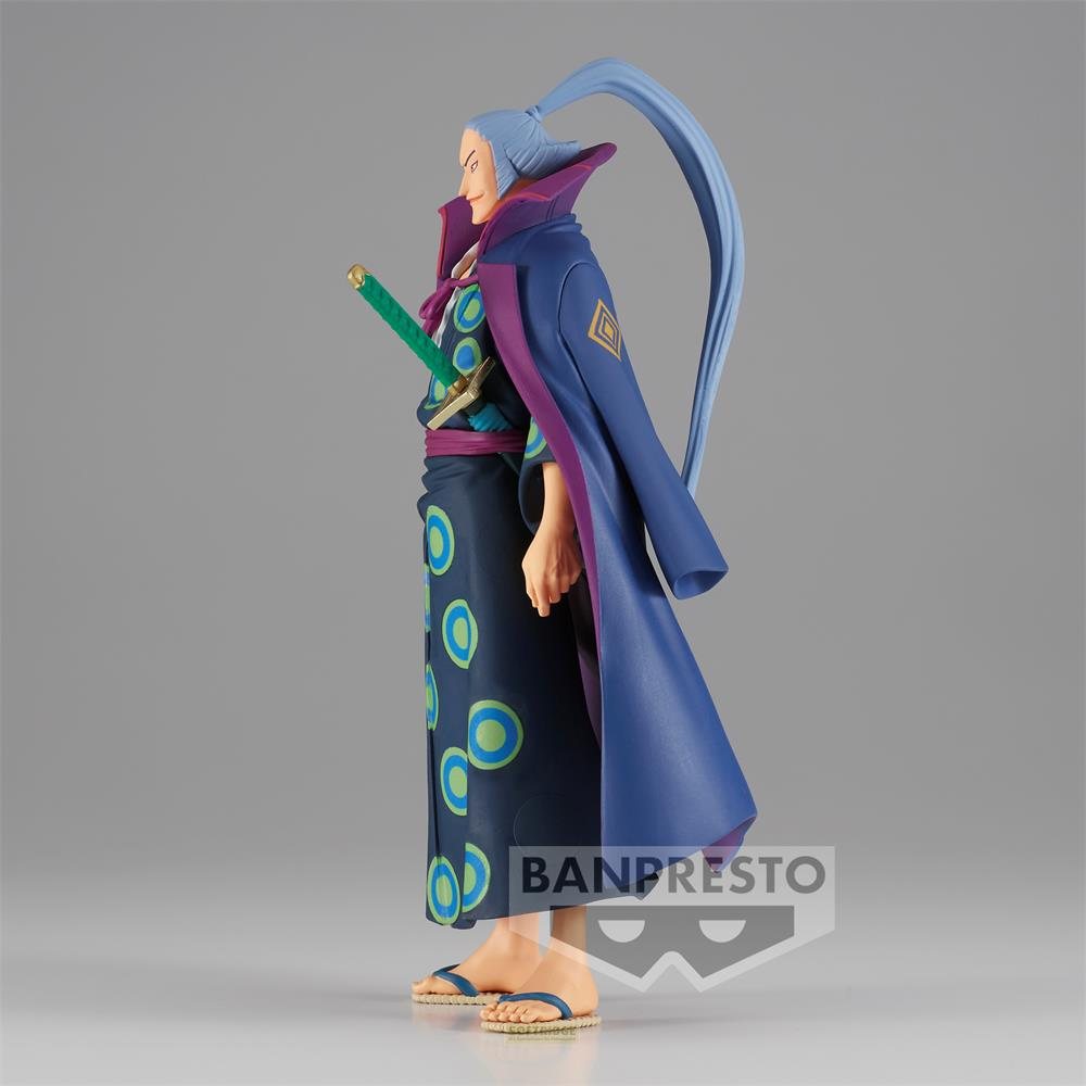 Eine Figur eines Mannes mit blauem Haar, der einen blauen Mantel und ein dunkles Gewand trägt.