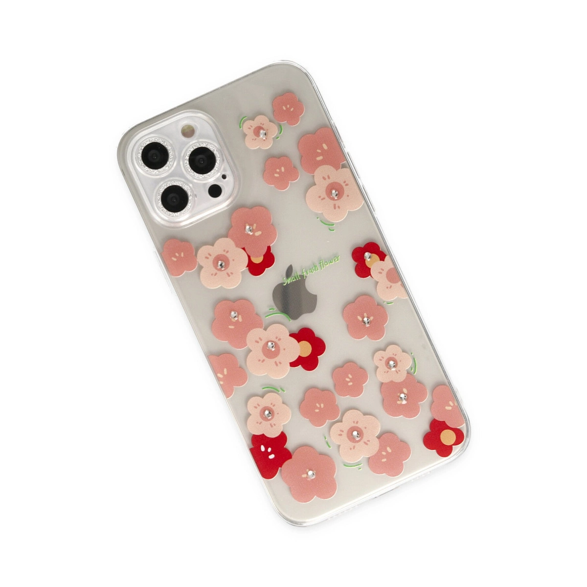 Pembe ve kırmızı çiçekler ve değerli taşlarla süslenmiş şeffaf telefon kılıfı.