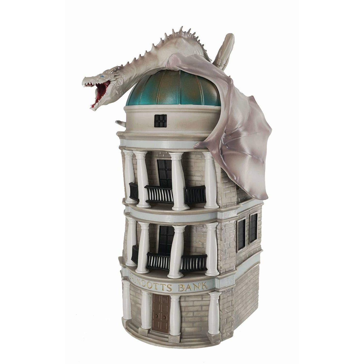 Ein Modell der Gringotts Bank mit einem weißen Drachen auf dem Dach.