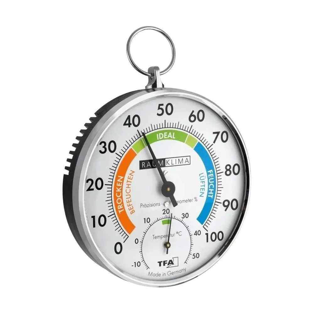 Ein runder TFA-Hygrometer und Thermometer mit silbernem Ring.