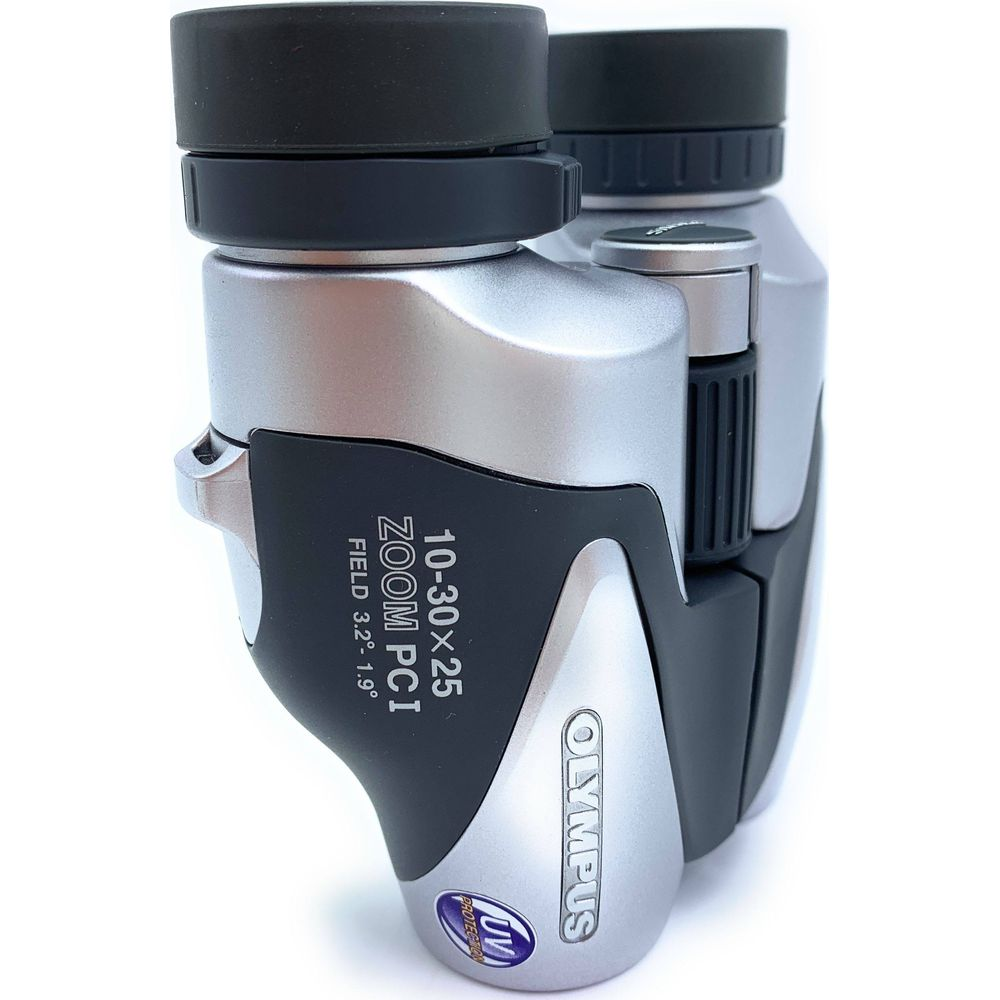 Srebrno-czarne lornetka zoom Olympus z czarnymi osłonami obiektywu.