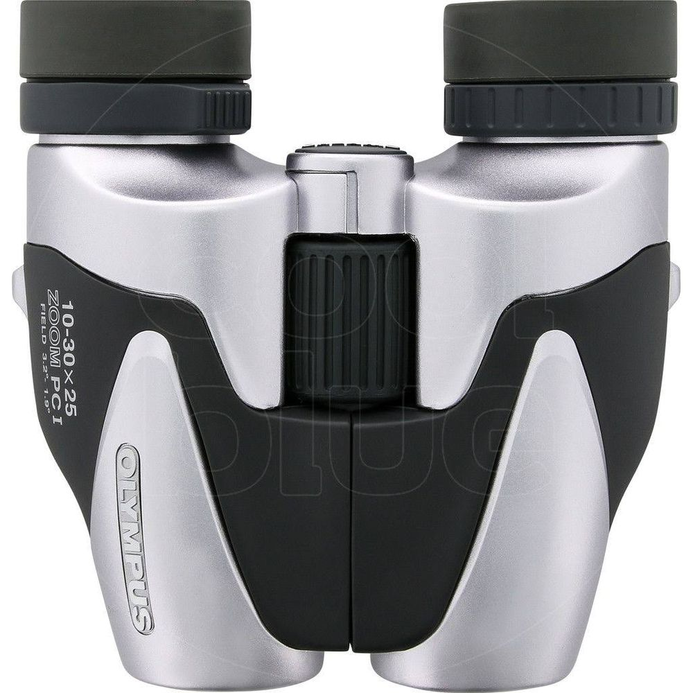 Srebrno-czarne lornetka Olympus z kółkiem ostrości pośrodku.