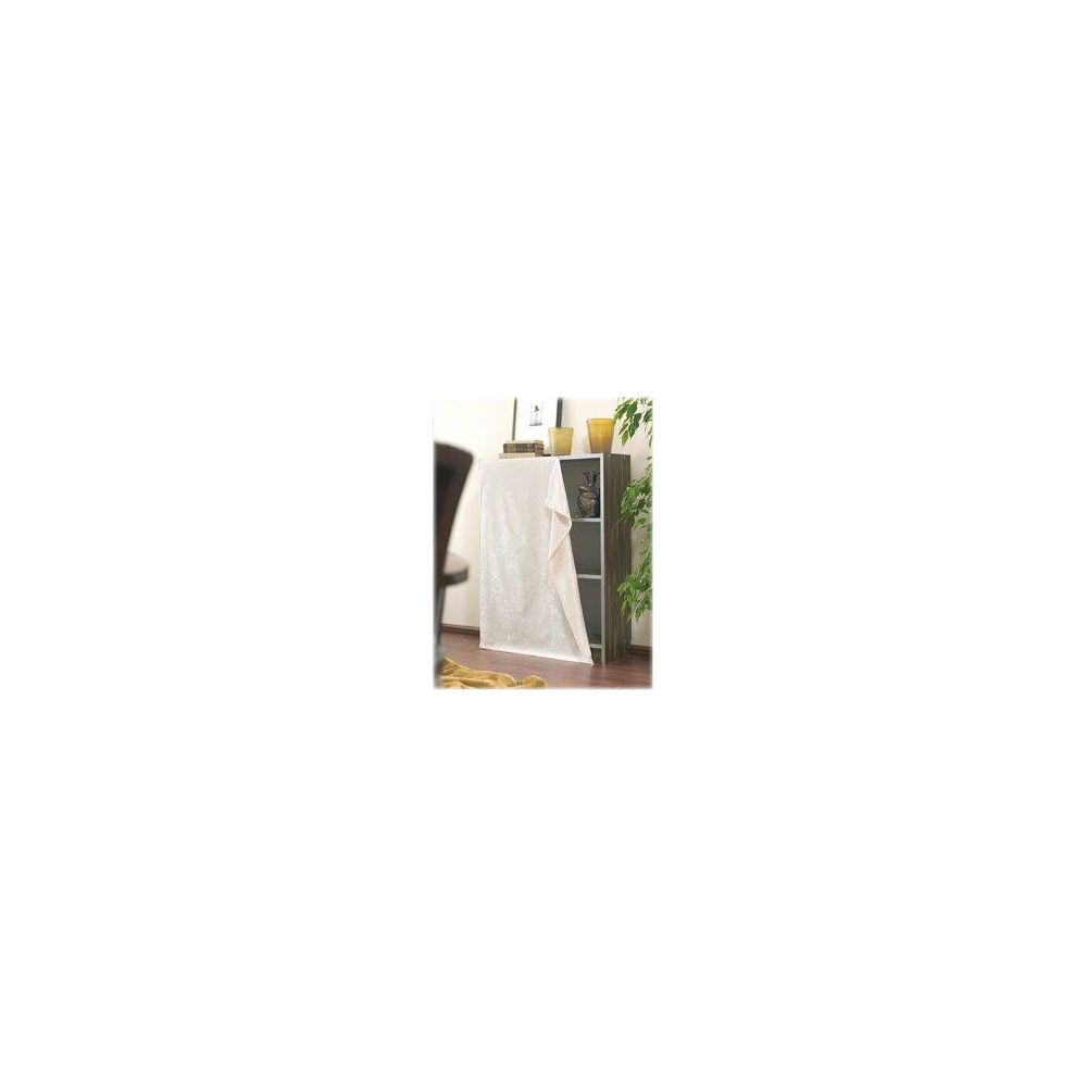 A white cloth hangs over a dark shelf, with a chair and plant beside it.