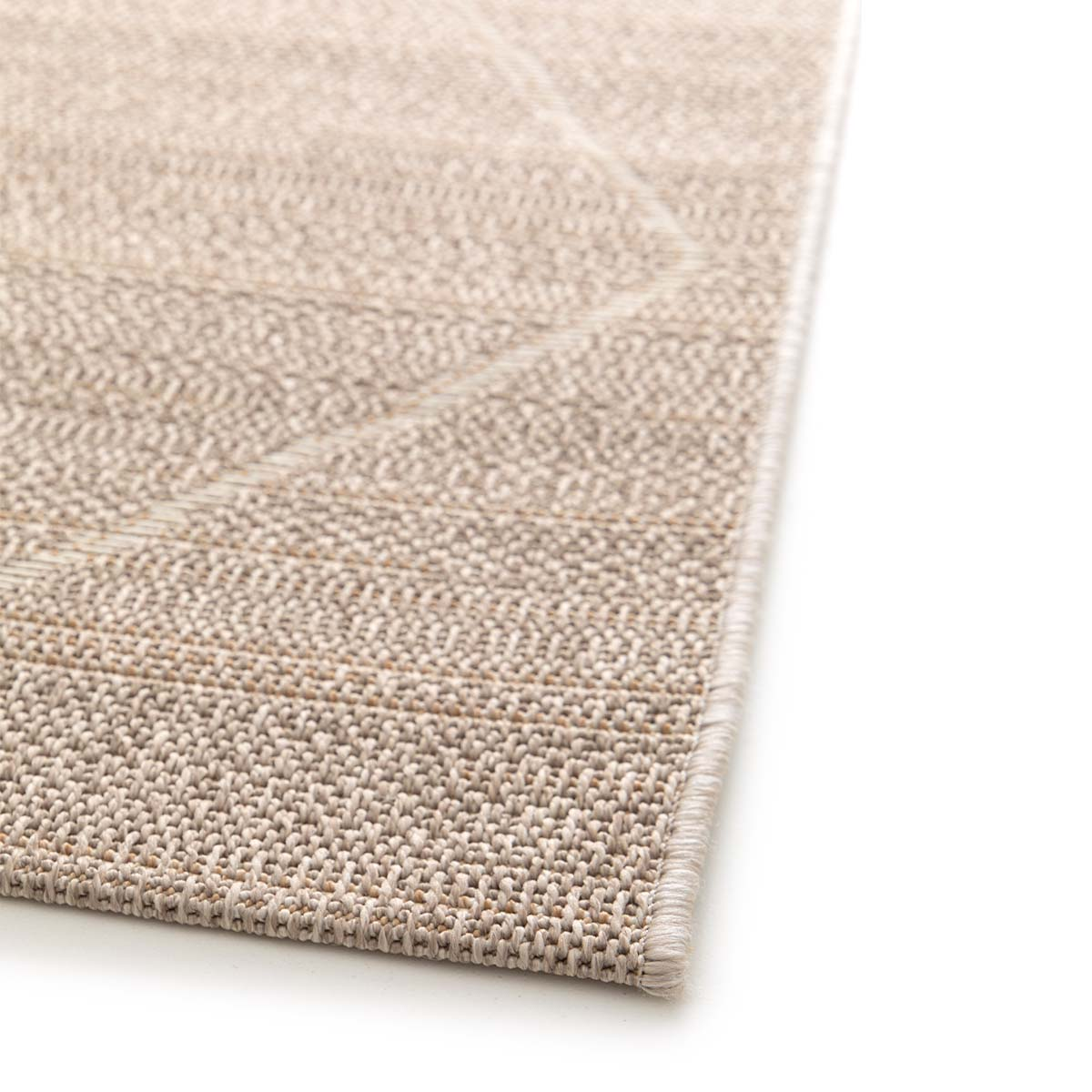 Beige tapijt met geometrische lijnen, close-up.