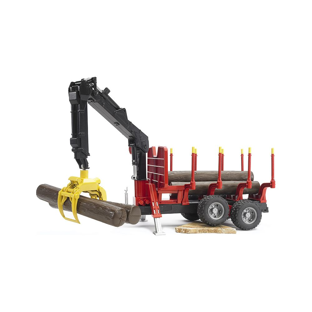 Czerwony samochód ciężarowy do przewozu drewna z żurawiem podnosi kłodę.