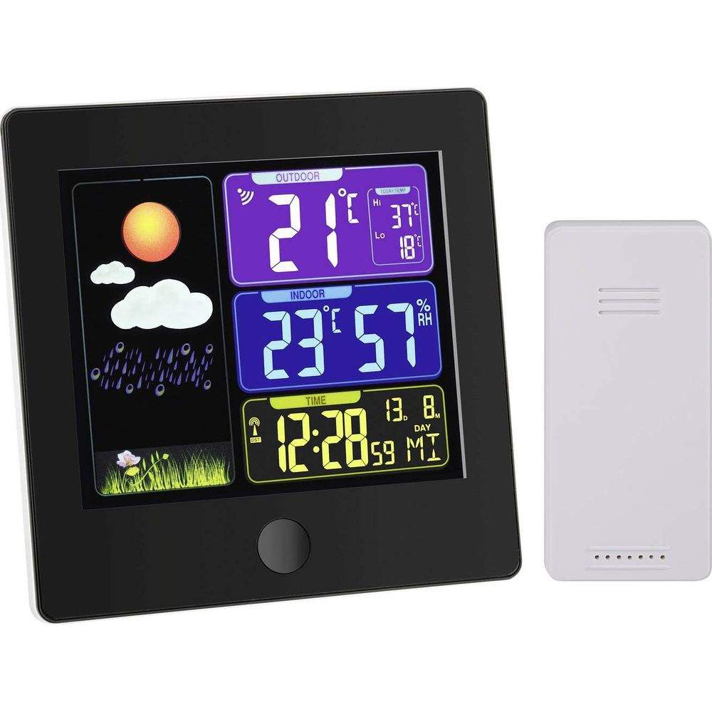 Cyfrowa stacja pogodowa: temp. zewn. 21C, wewn. 23C, czas 12:28.