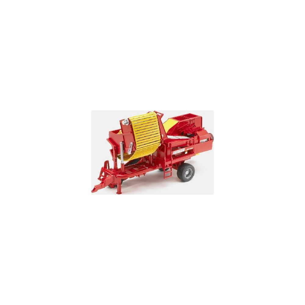 Ein roter Kartoffelroder mit gelben Bändern auf einem Rad.