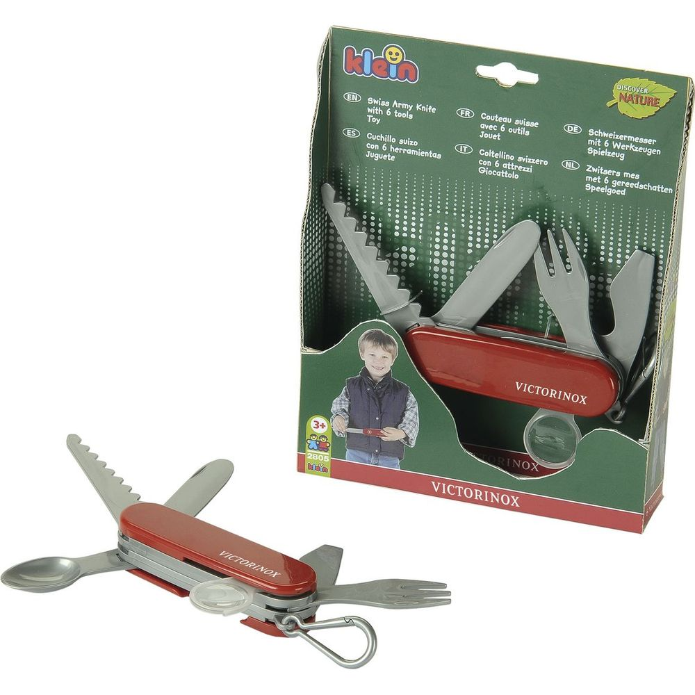 Rotes Spielzeug-Schweizer Taschenmesser mit Gabel, Löffel und Säge.