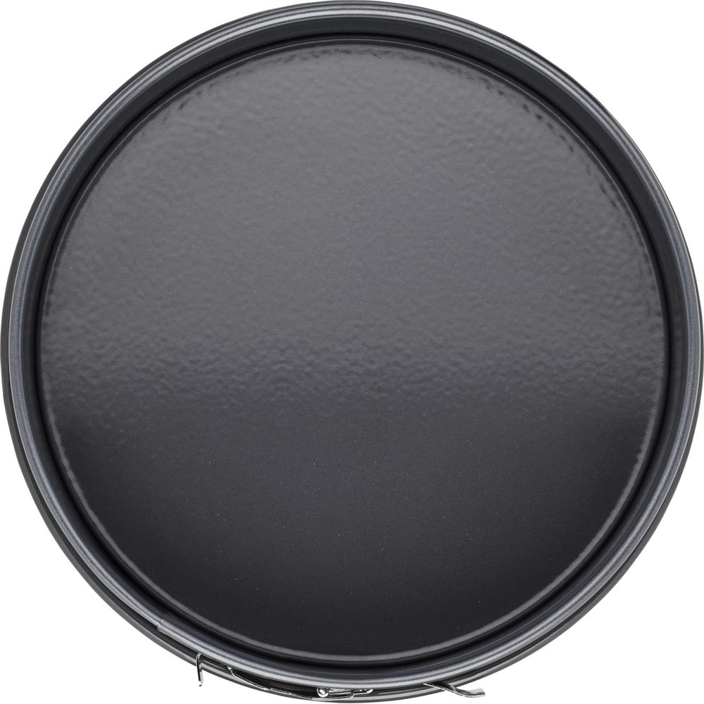 Okrągła, czarna forma do ciasta z odpinaną obręczą i srebrną dźwignią.