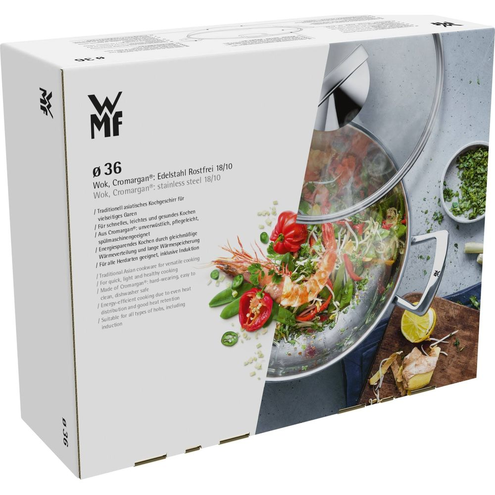 WMF Wok mit Deckel, gefüllt mit Garnelen und Gemüse. Stainless steel 18/10.