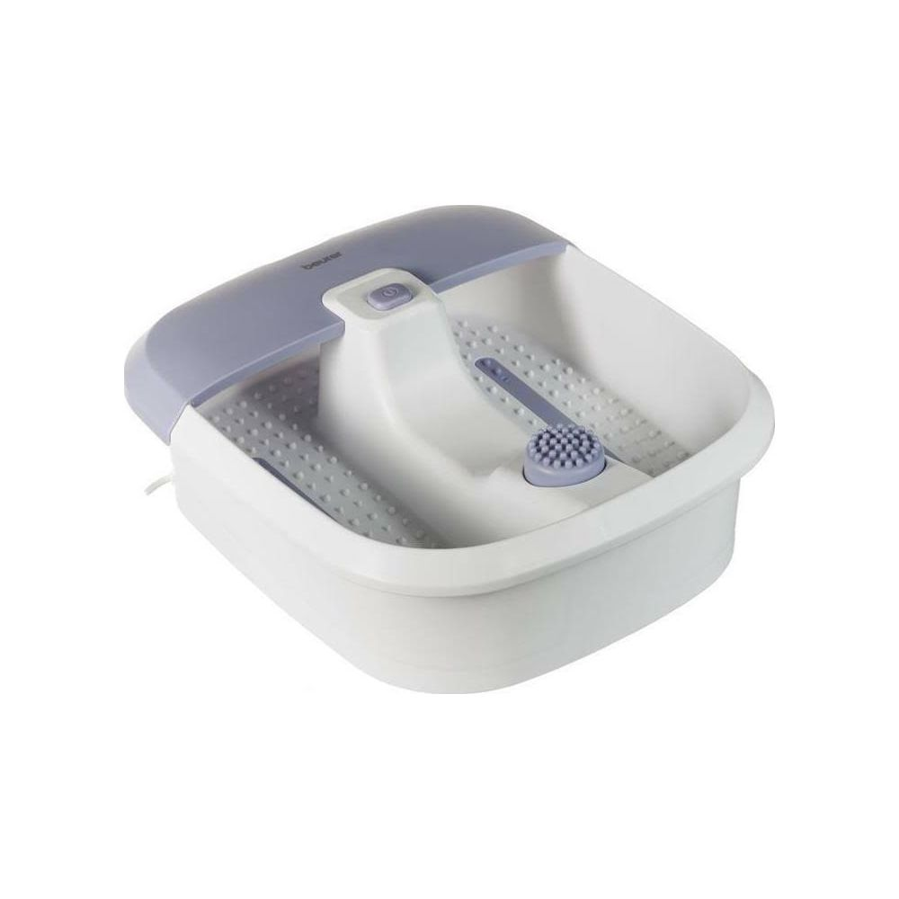 Ein weißer Fußbad-Massager mit lila Akzenten und Noppen.