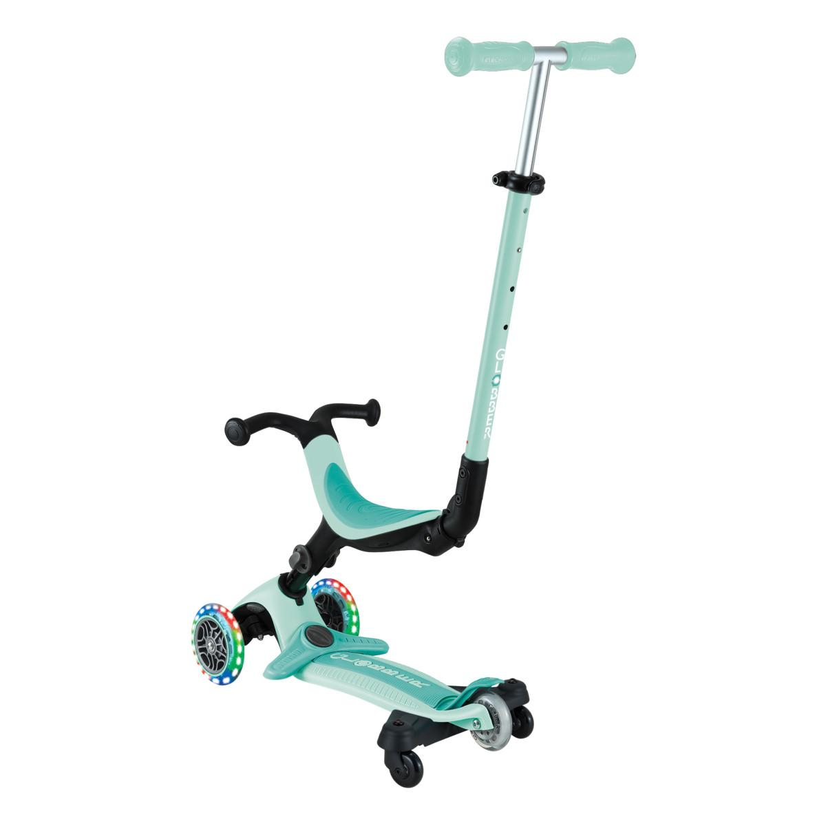 Monopattino verde menta con sedile, manubrio e ruote luminose.