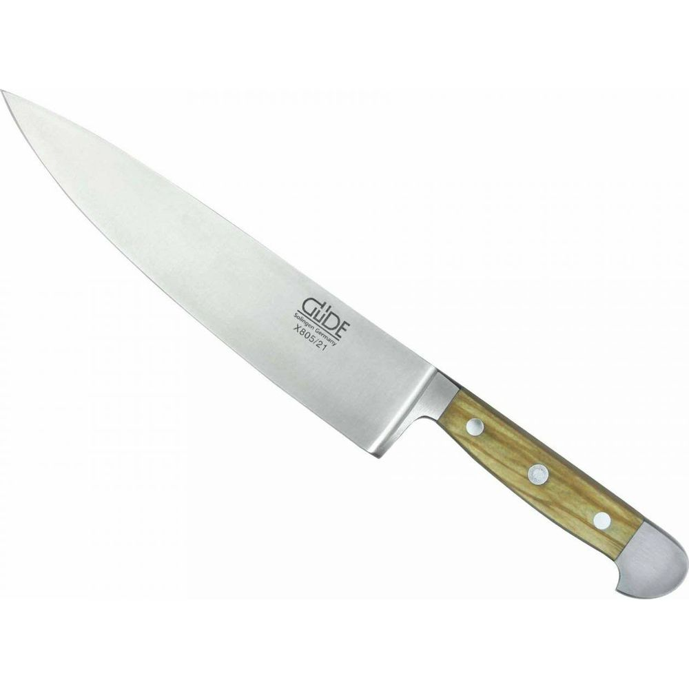Ein Kochmesser mit hellem Holzgriff und silberner Zwinge.
