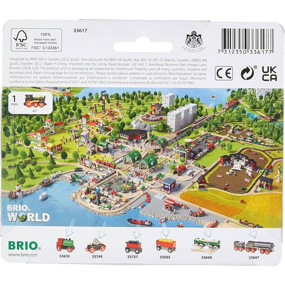 Krajobraz kolejki zabawkowej z pociągami, domami i drzewami.