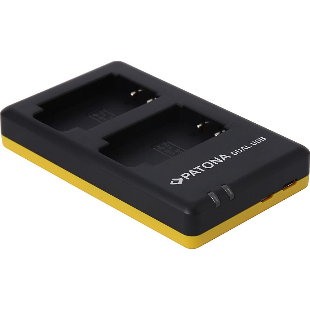 Caricabatterie doppio nero con bordo giallo, due slot e porta USB.