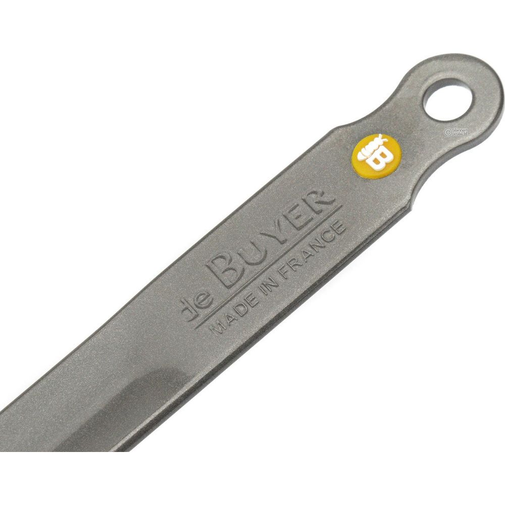 Grauer Griff mit gelbem Logo und Aufschrift 'de BUYER MADE IN FRANCE'.