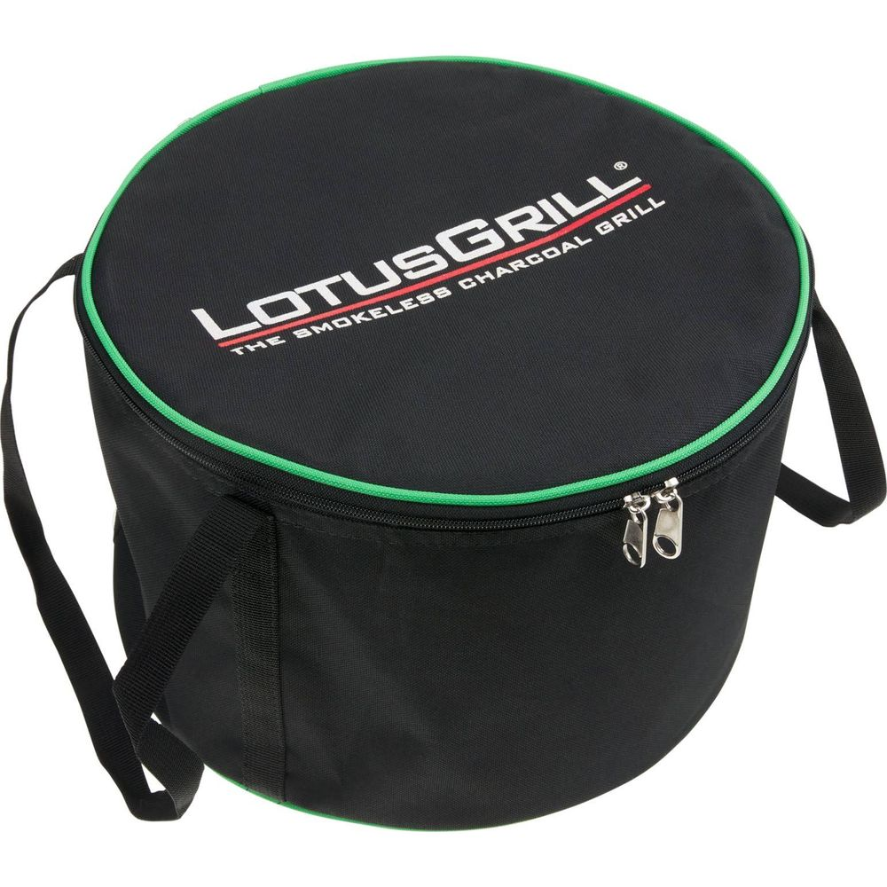 Czarna torba transportowa z zielonym wykończeniem i zamkiem błyskawicznym do grilla.