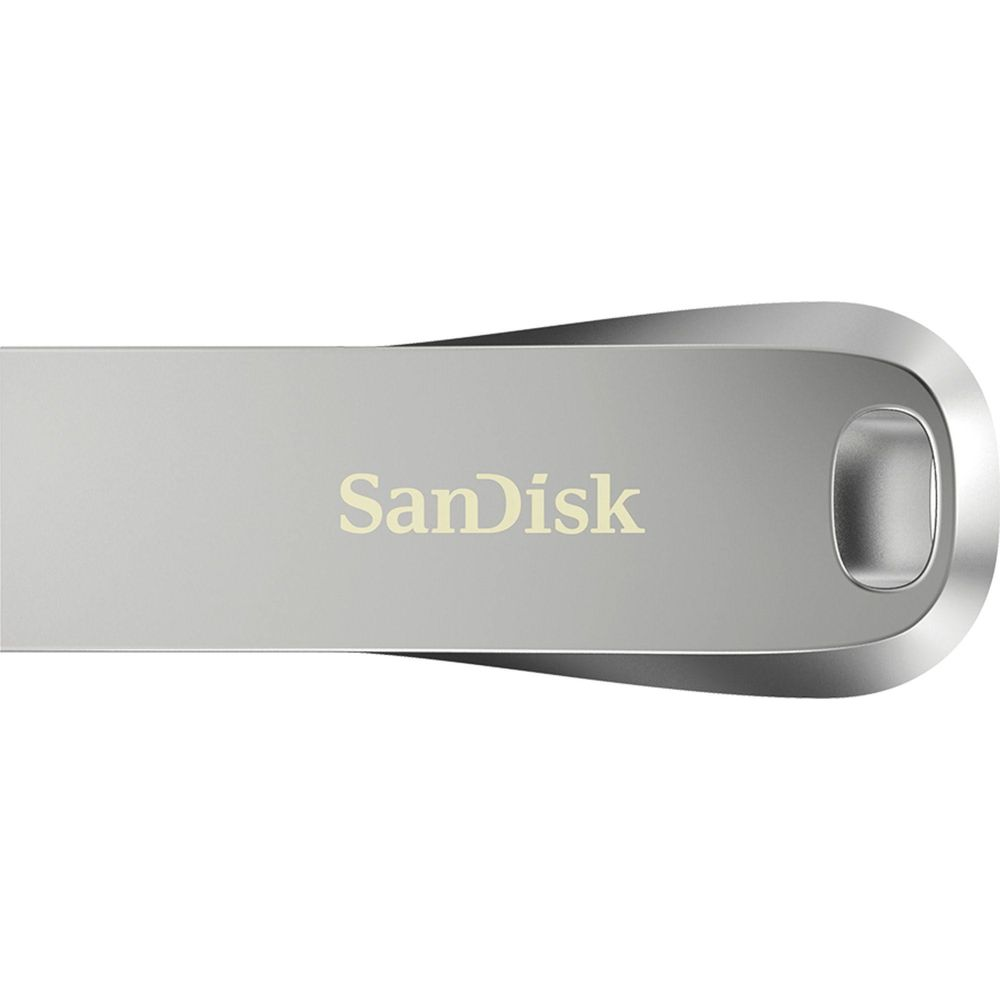 Srebrny pendrive z logo Sandisk.