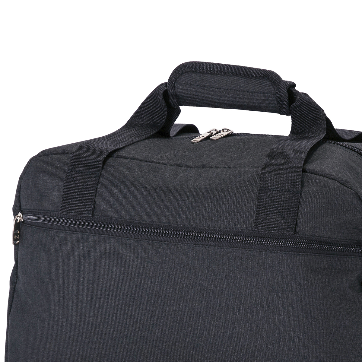 Primer plano de un bolso de lona negro con dos cremalleras y asas.