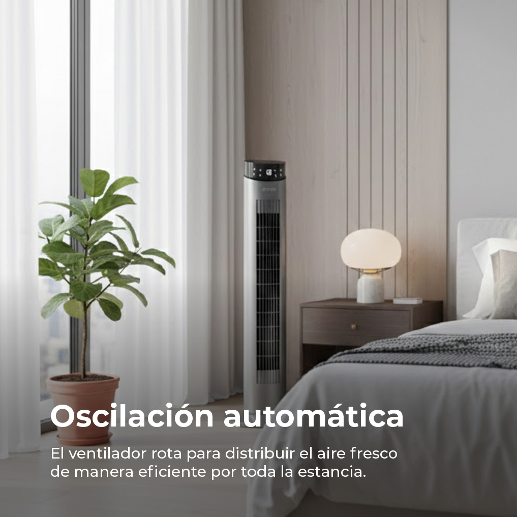 Un elegante ventilador de torre junto a una cama en un dormitorio.