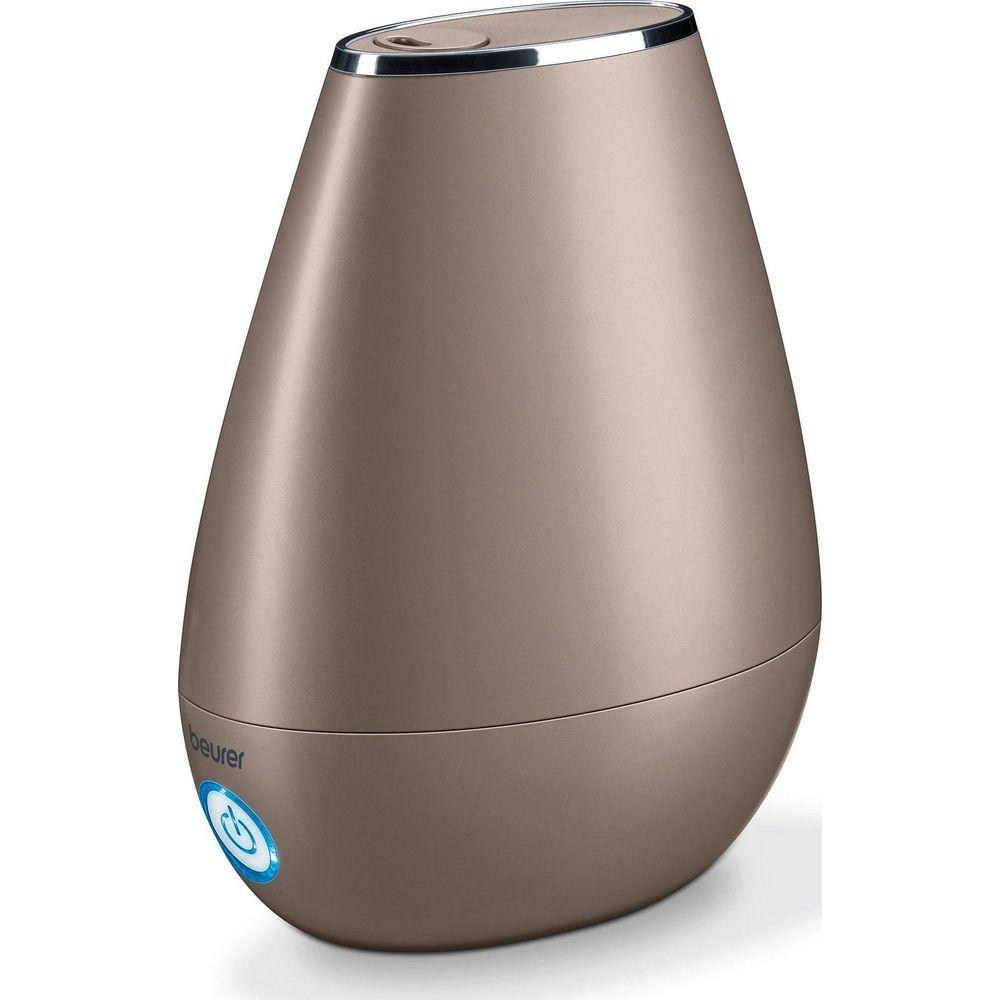 Ein bronzefarbener Luftbefeuchter mit silbernem Rand und Bedienelement.