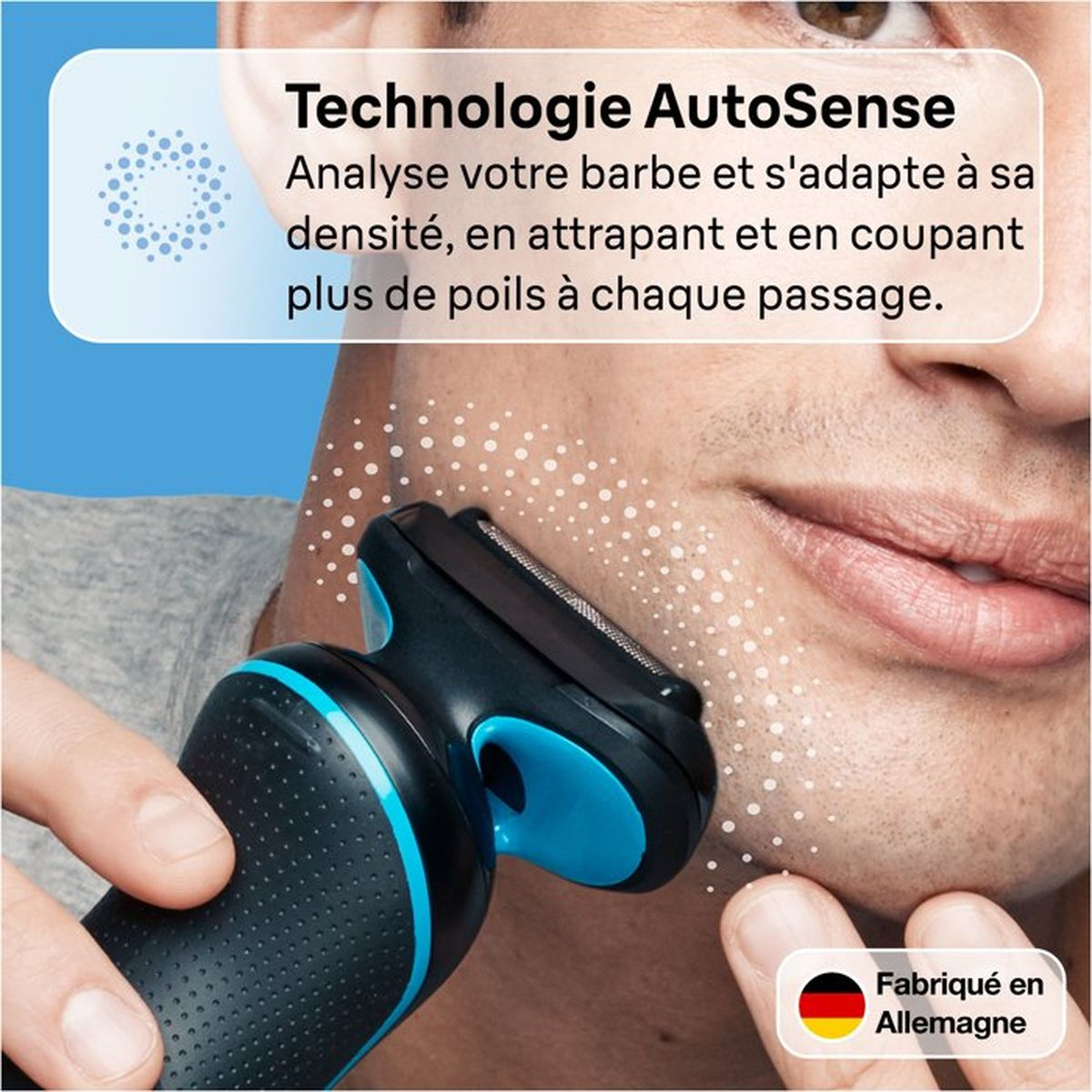 Ein Mann rasiert sich mit einem schwarzen und blauen Elektrorasierer. AutoSense-Technologie.