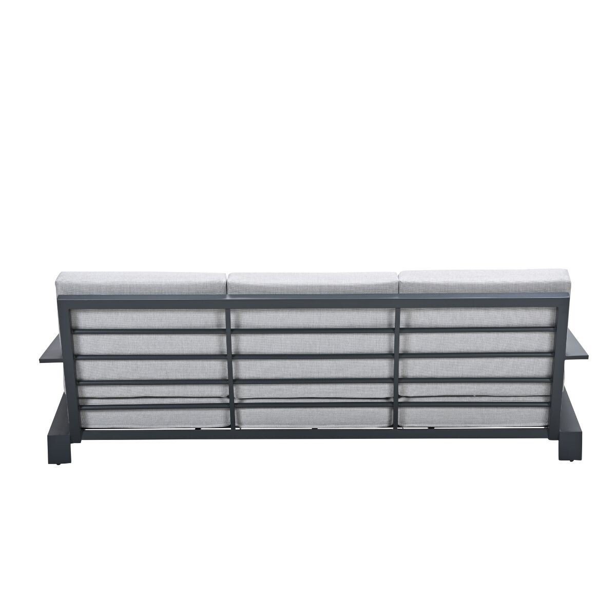 Grijze bank met metalen frame, van achteren gezien.