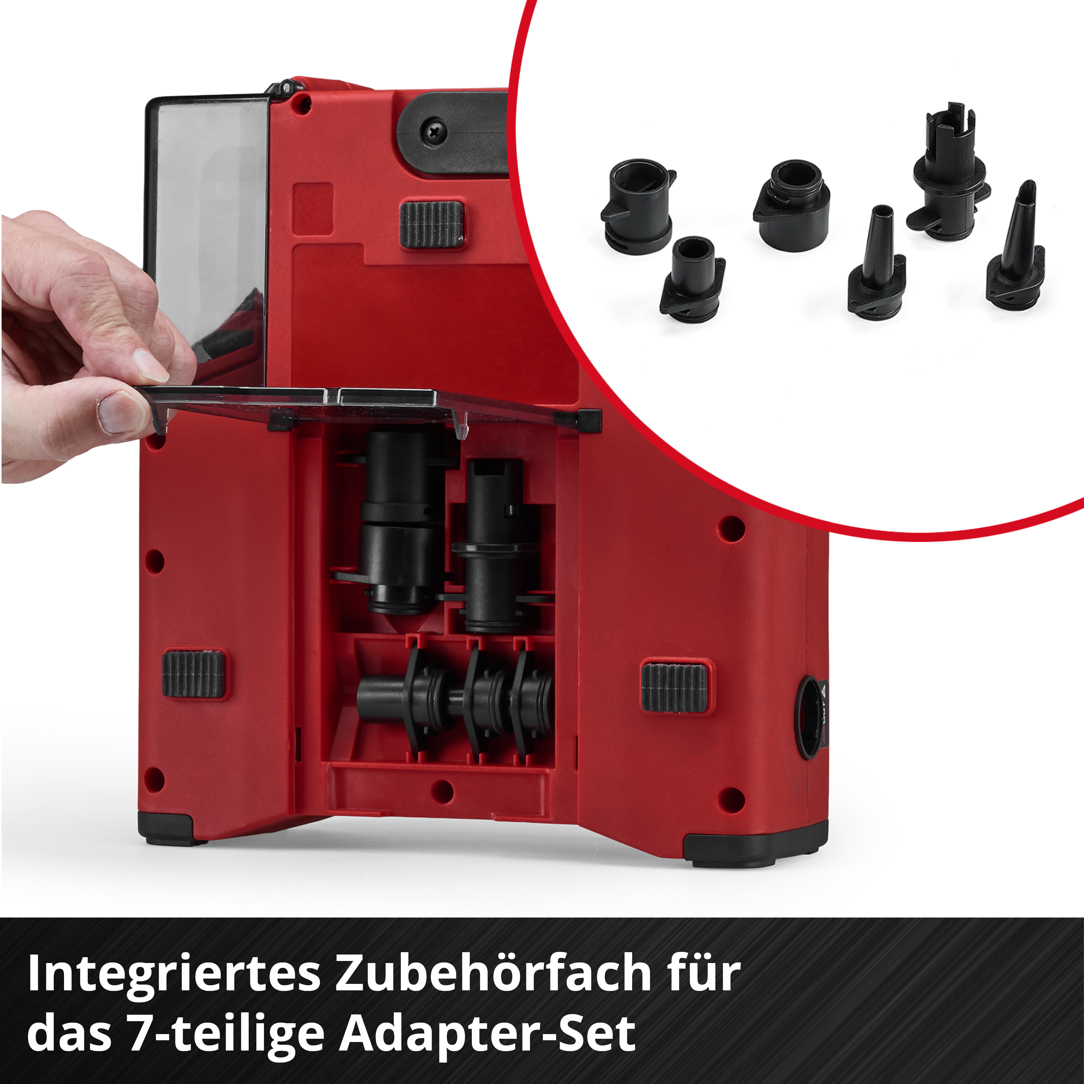 Rotes Gerät mit offenem Fach und Zubehörteilen. Hand öffnet Klappe.