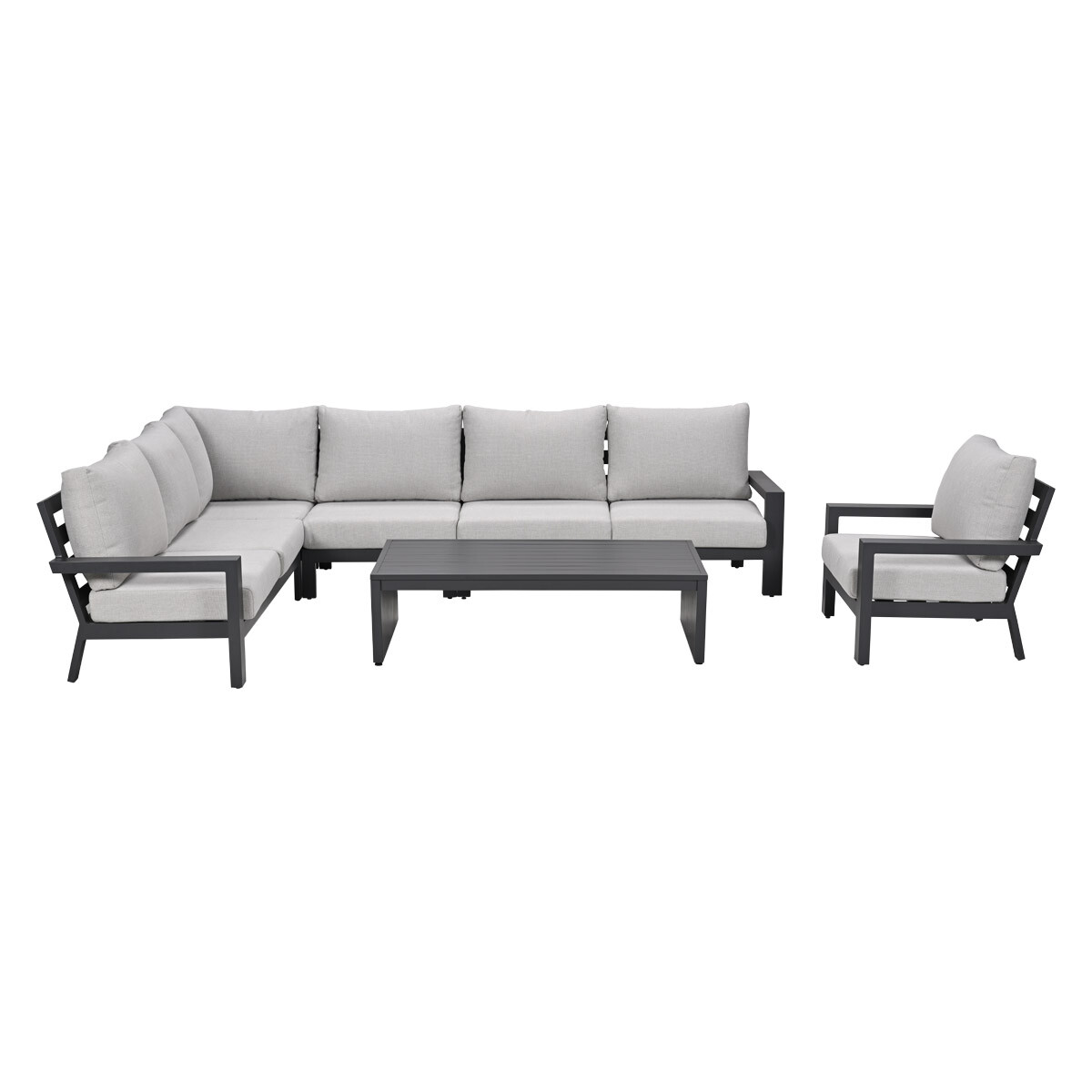 Gray sectional sofa with 4 seats, a coffee table, and an armchair.