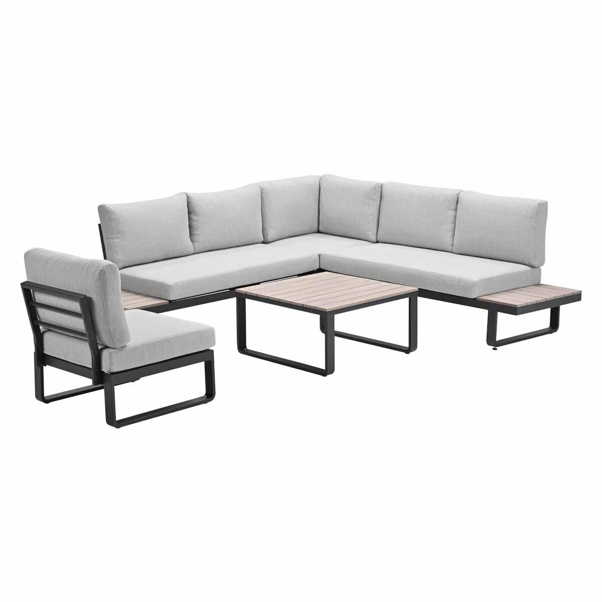 Gray sectional sofa with black metal frame, wood table, and separate armchair.