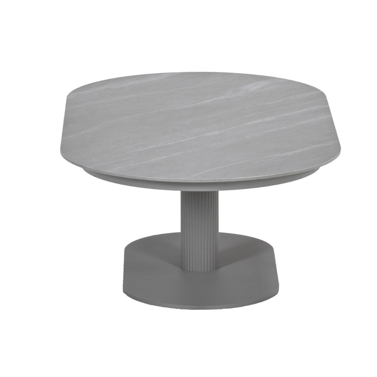 Een grijze ronde tafel met een gegroefde voet en een blad met steenlook.