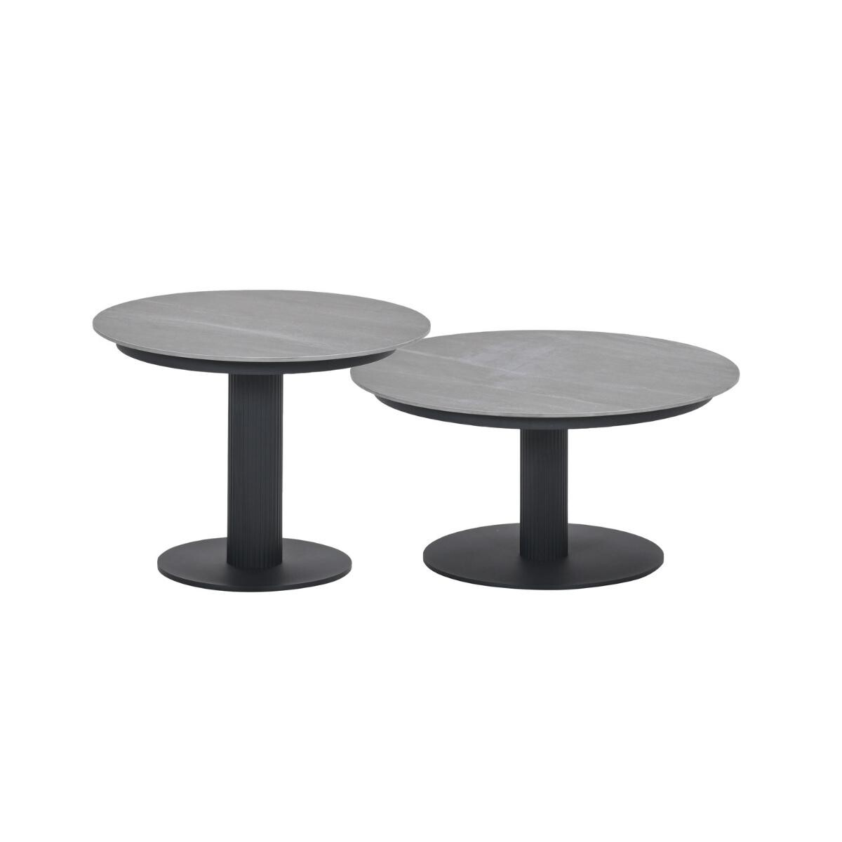 Two round grey coffee tables with black bases stand side by side.