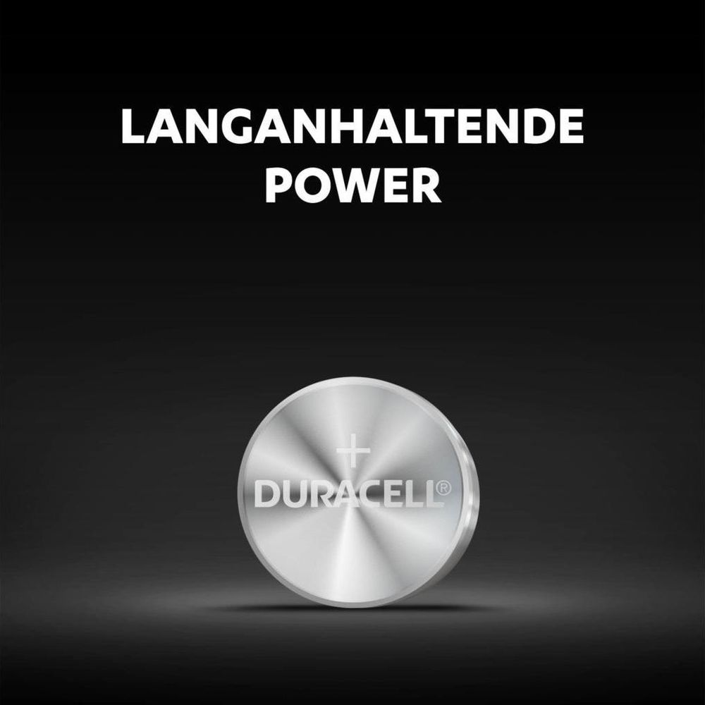 Srebrna bateria guzikowa Duracell ze znakiem plus i logo.