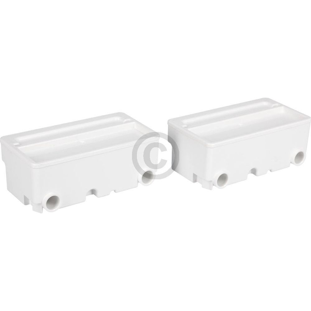 Dwa białe plastikowe pudełka z okrągłymi otworami po bokach.